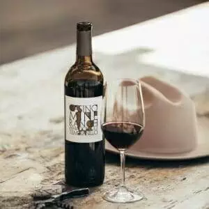 A table with a 2017 Casino Mine Ranch Tempranillo.