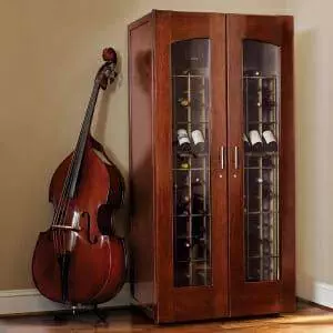 Le Cache Vault 3100 Wine Cabinet Classic Cherry adjacent bass.