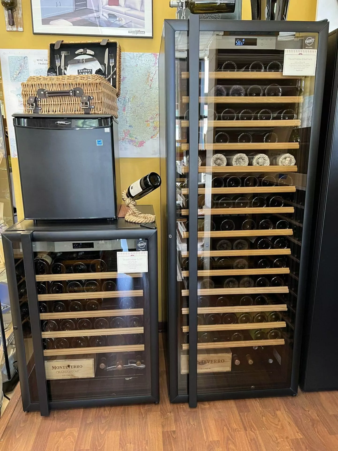 Wine cooler, bottles of wine.