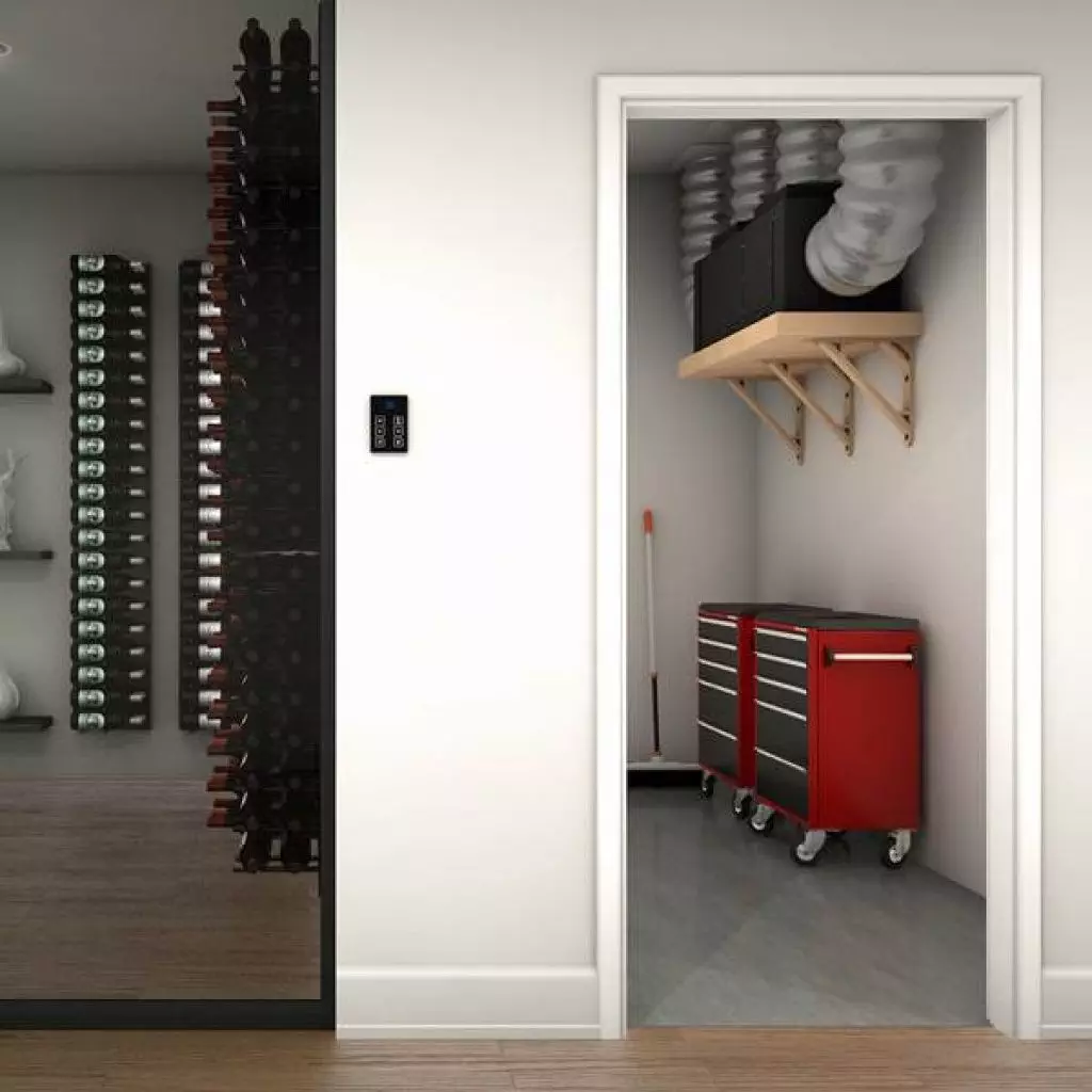 A room with a red rolling tool cabinet, mop, and HVAC unit on a wooden shelf. Adjacent is a glass-walled wine storage area with multiple wine bottles.