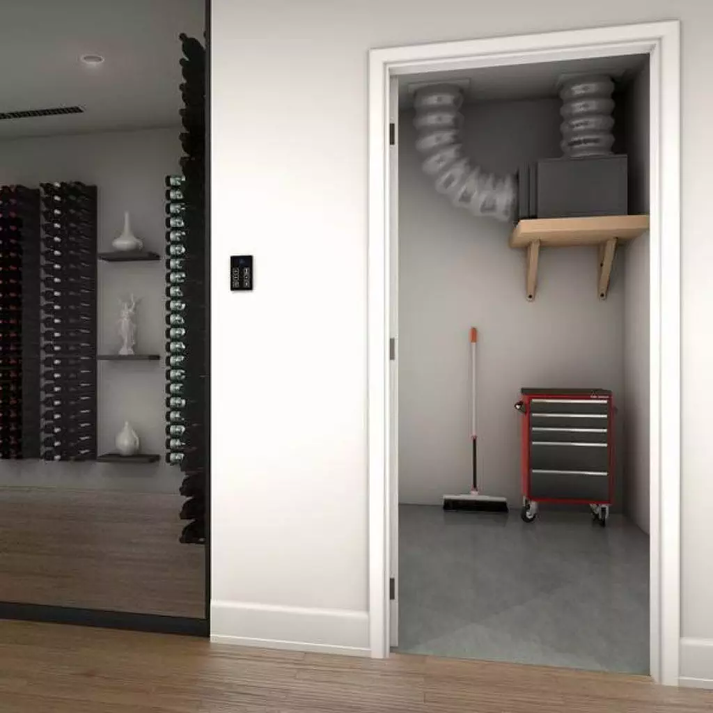 A small utility closet with a red tool cabinet, broom, and water heater. A large room with wine racks and a sculpture can be seen adjacent to the closet.